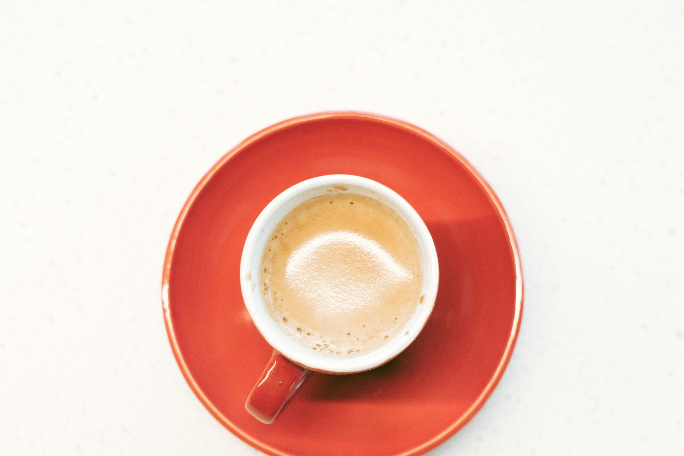 Espresso in a cup with a saucer and spoon