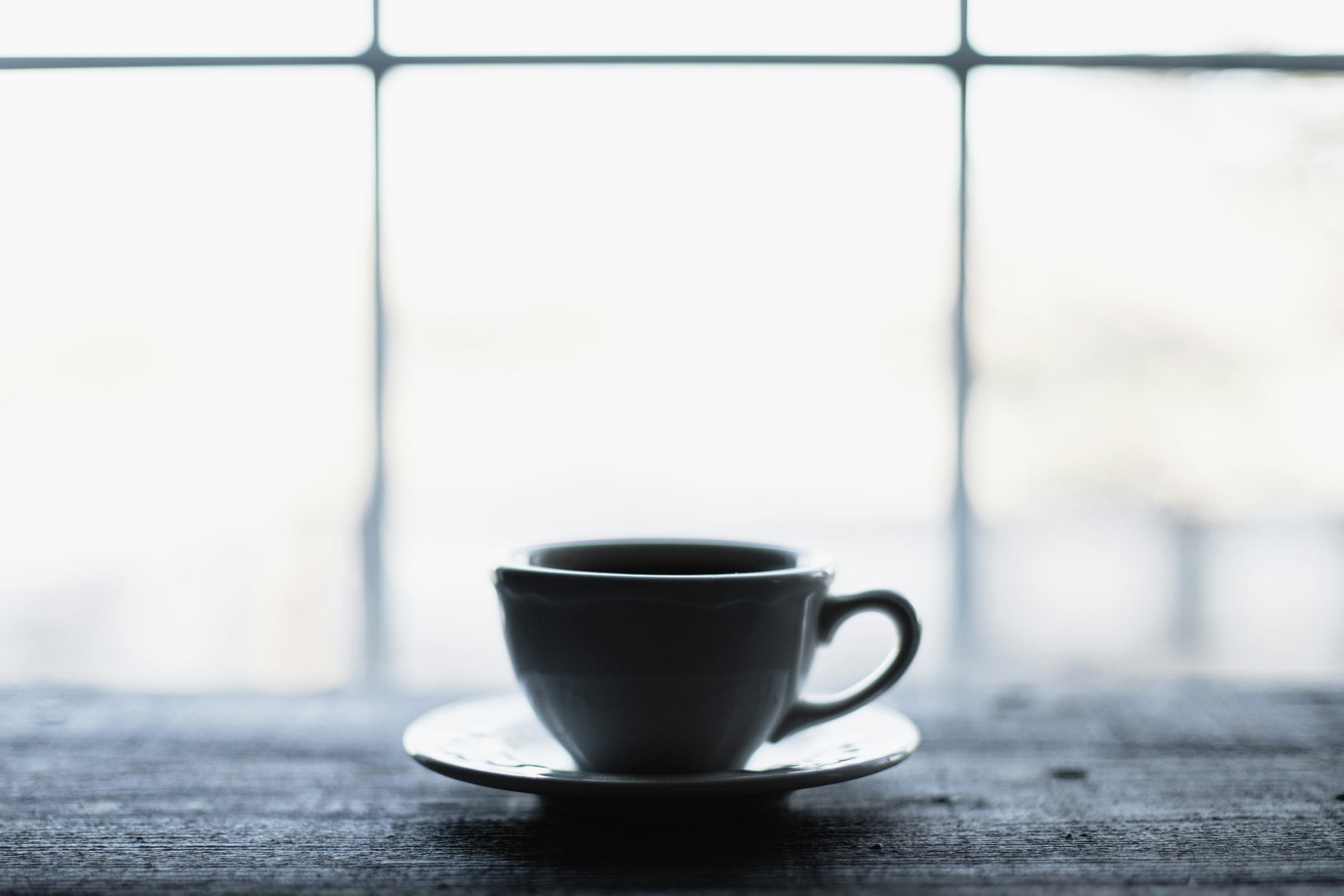 A cup and saucer resting on a table